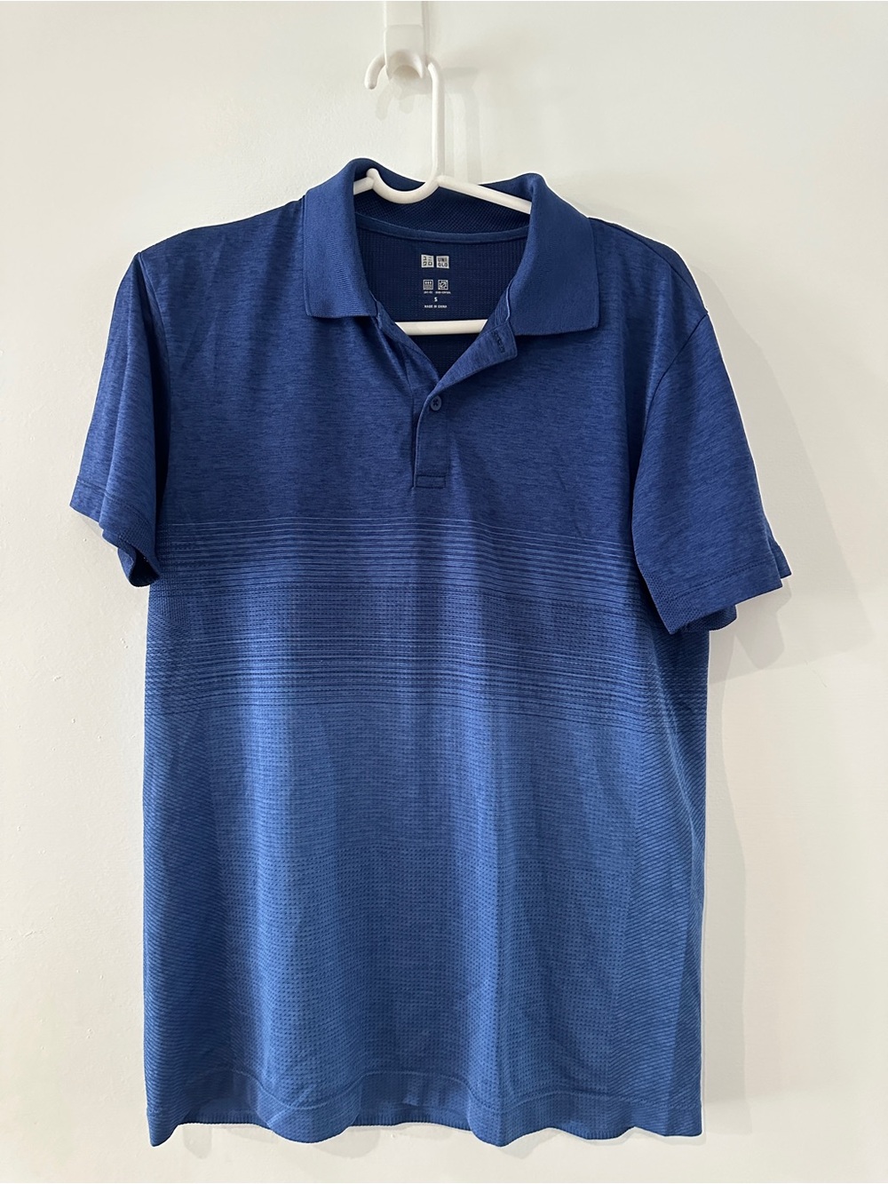 Uniqlo men's blue polo shirt small